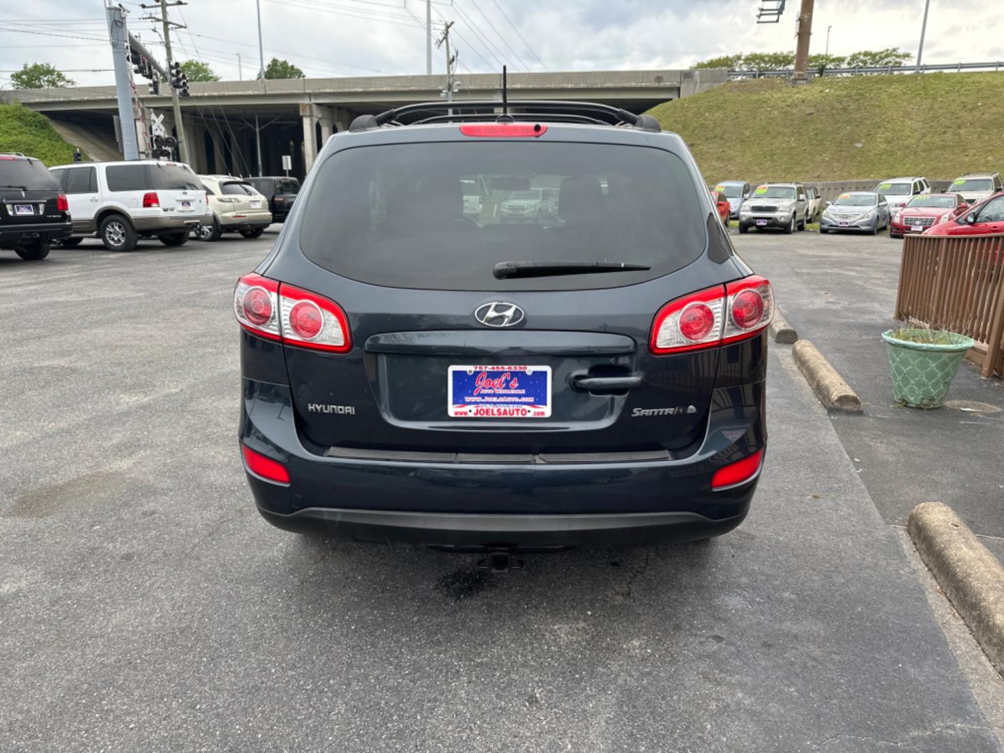 2011 Blue Hyundai Santa Fe (5XYZG3AB5BG) , located at 5700 Curlew Drive, Norfolk, VA, 23502, (757) 455-6330, 36.841885, -76.209412 - Photo#2